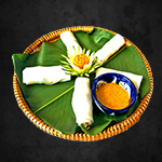GRIPPED PORK WRAPPED WET RICE PAPER
